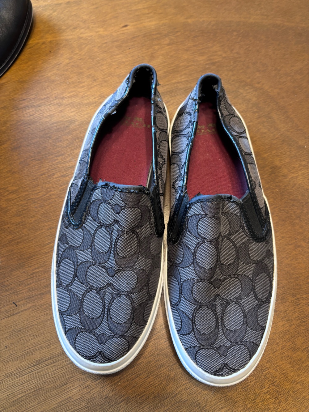 Coach Signature Slip-On Sneakers in Charcoal and Black